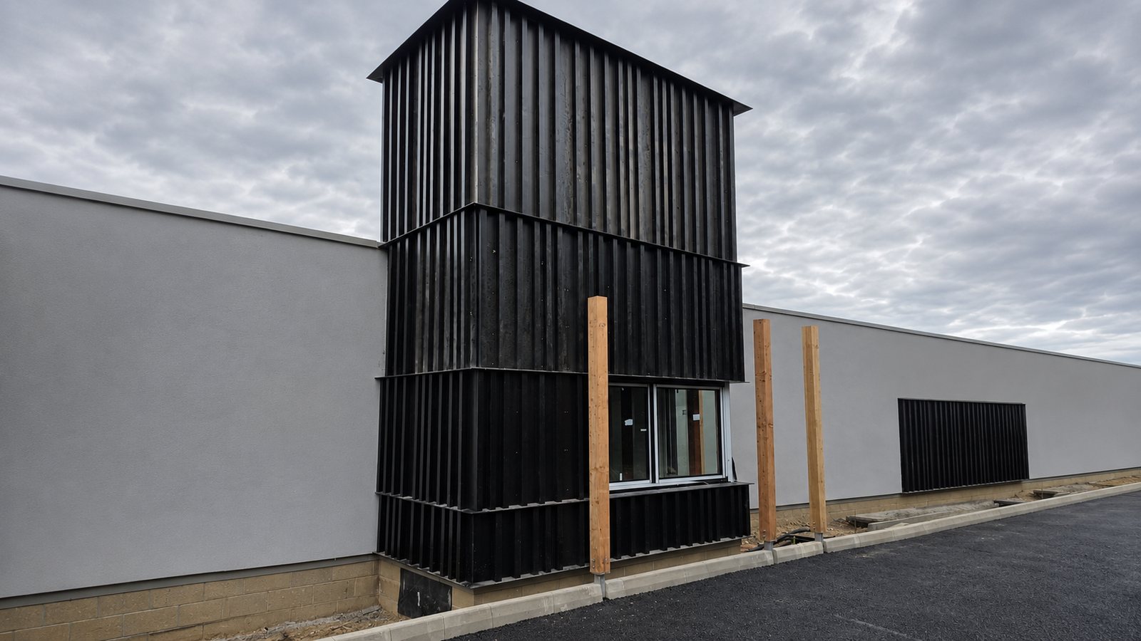 Completed black feature cladding on the Starbucks drive-thru